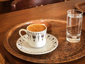 Coffee cup on table