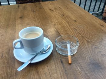 High angle view of coffee cup on table