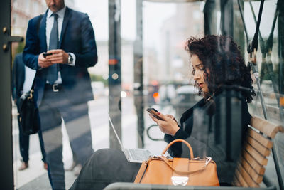 Woman holding mobile phone