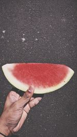 Hand held watermelon is quite refreshing