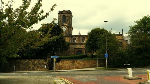 View of road along buildings