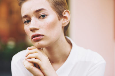 Close-up portrait of young woman outdoors