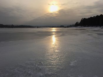 Scenic view of sea against sky during sunset