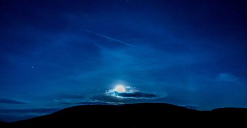 Low angle view of blue sky at night