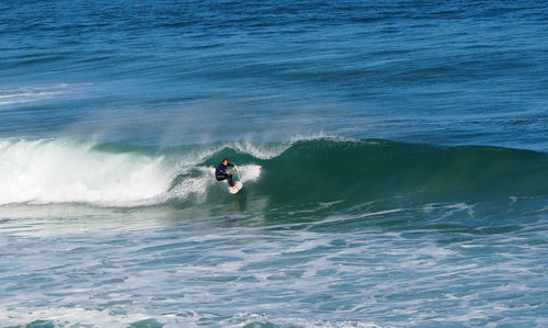 Man surfing in sea