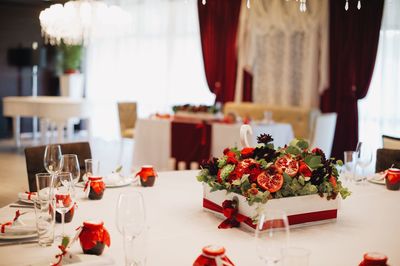 Red flower on table in restaurant