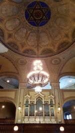 Low angle view of illuminated ceiling in cathedral