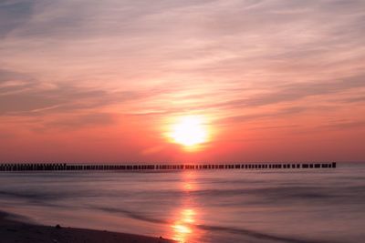 Scenic view of sea at sunset