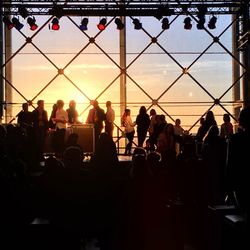 Silhouette of people at sunset