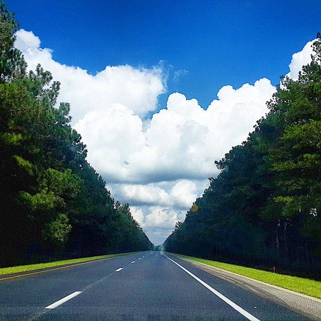 road, the way forward, transportation, tree, sky, road marking, country road, diminishing perspective, vanishing point, cloud - sky, cloud, empty road, blue, nature, asphalt, mountain, tranquility, street, landscape, tranquil scene