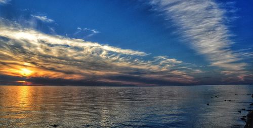 Scenic view of sea at sunset