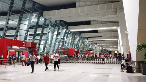 Group of people walking in city