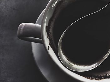 High angle view of coffee cup on table