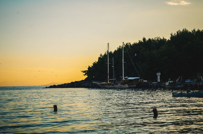 Scenic view of sea against sky during sunset