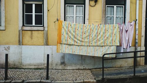 Clothes drying against building