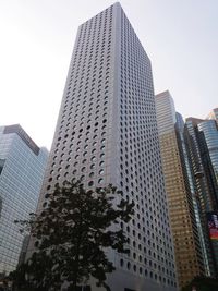 Low angle view of modern buildings against sky