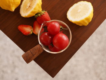 High angle view of chopped fruits on cutting board
