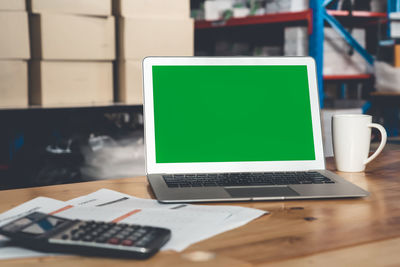 Close-up of laptop on table