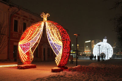 Illuminated christmas tree at night
