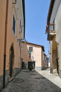 Old houses on a narrow street in maenza, a medieval village near rome in italy.