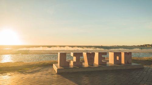 View of beach at sunset