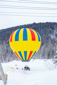 Hot air balloons against sky
