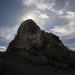 Low angle view of rock formations against sky