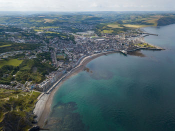 High angle view of city by sea