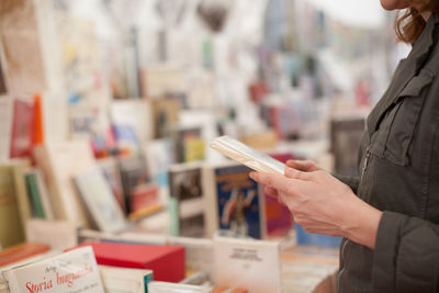 Close-up of woman using mobile phone