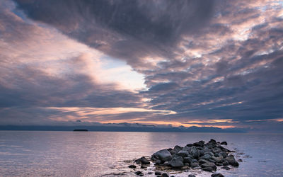 Scenic view of sea against sky during sunset