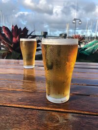 Close-up of beer glass on table