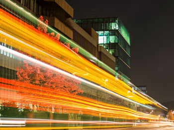 Light trails on city street at night