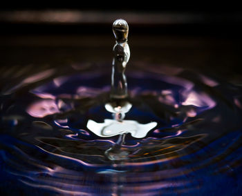 Close-up of drop splashing in water