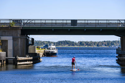 Man paddle boarding