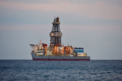 Sea ship in sea against sky