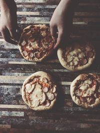 High angle view of person preparing food on table