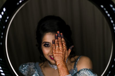 Portrait of young woman at music concert