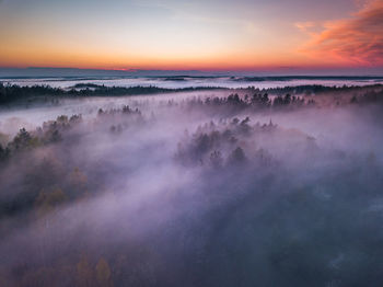 Scenic view of landscape against sky during sunset