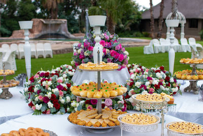 Various flowers on table