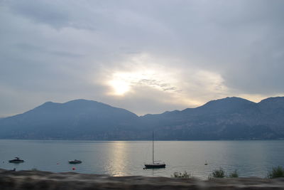 Scenic view of sea against cloudy sky