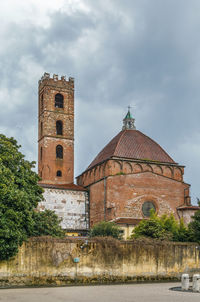 Cathedral by building against sky