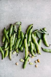 High angle view of green chili peppers