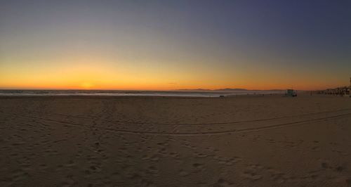 Scenic view of sea at sunset