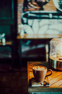 Coffee cup on table