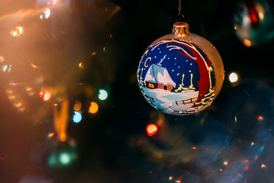 Close-up of illuminated christmas tree at night