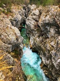 High angle view of rocks in river