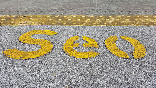 High angle view of text on road