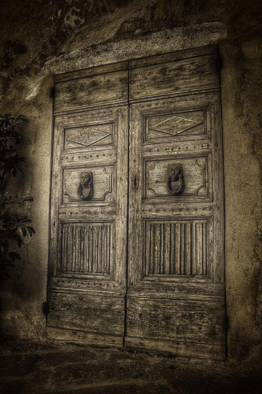 door, closed, built structure, architecture, wood - material, building exterior, entrance, safety, wooden, protection, security, old, house, wood, doorway, weathered, wall - building feature, window, day, no people