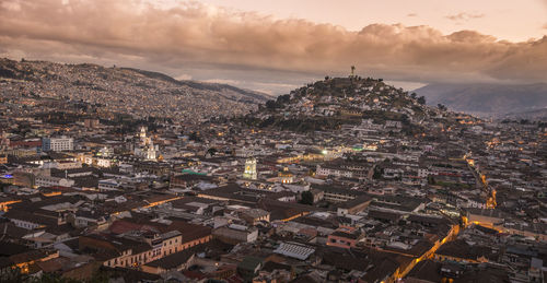 High angle view of cityscape against sky during sunset