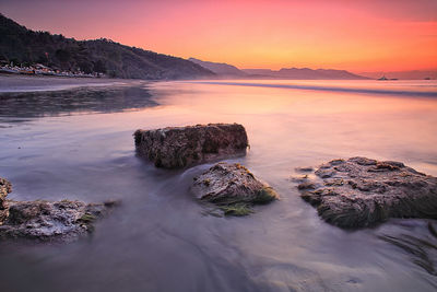 Scenic view of sea against sky during sunset